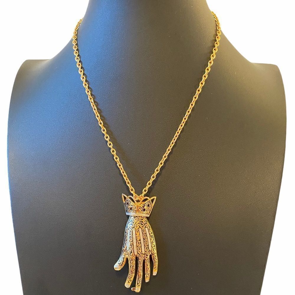 Patented Antique ladies  gloved hand pin/brooch on a beautiful gold tone chain.